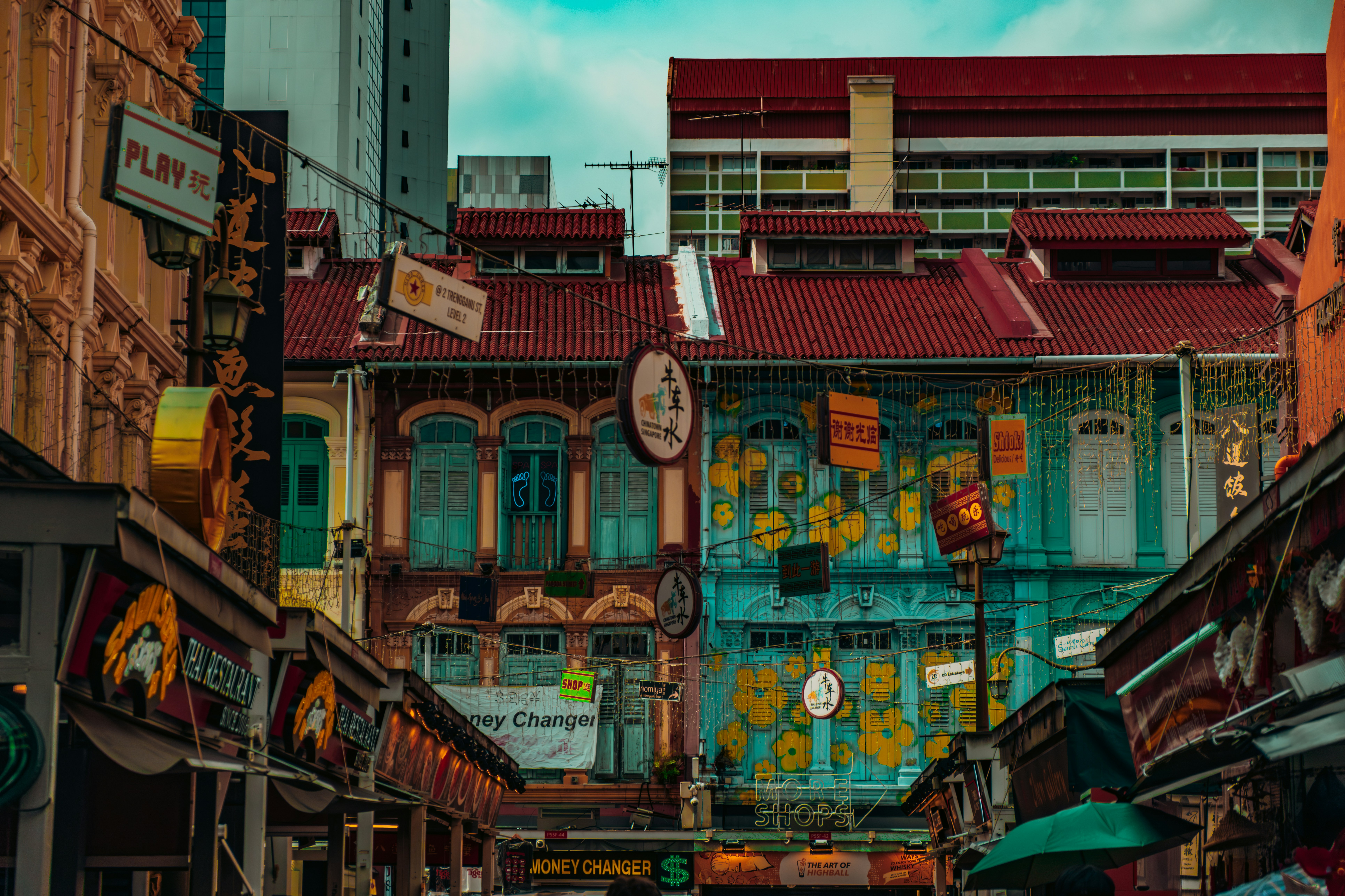 a city street filled with lots of tall buildings