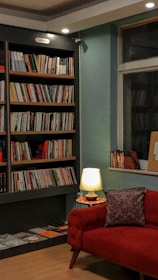 A cozy reading nook with soft lighting and comfortable cushions.