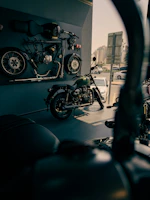 Custom 3D printed car and motorcycle accessories displayed on a garage wall