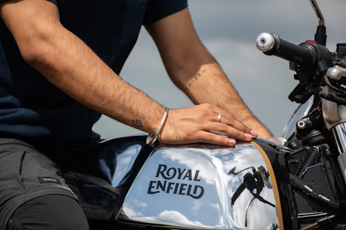 Close-up of person seated on a motorcycle