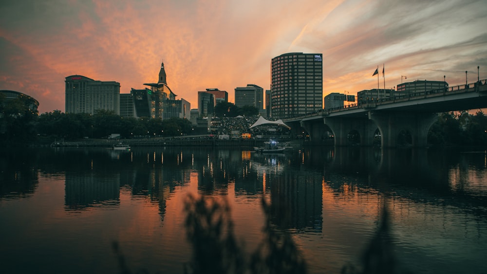 a view of a city with a bridge over a body of water