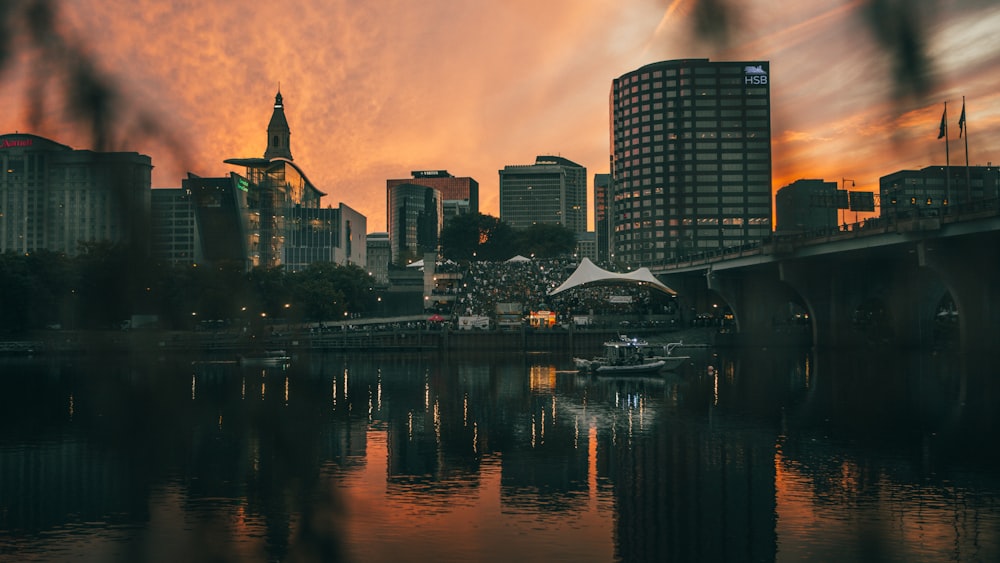 a view of a city with a bridge over a body of water