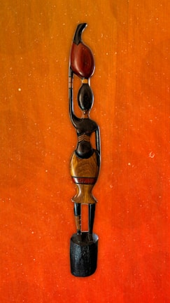 A unique wooden sculpture featuring a modern design.