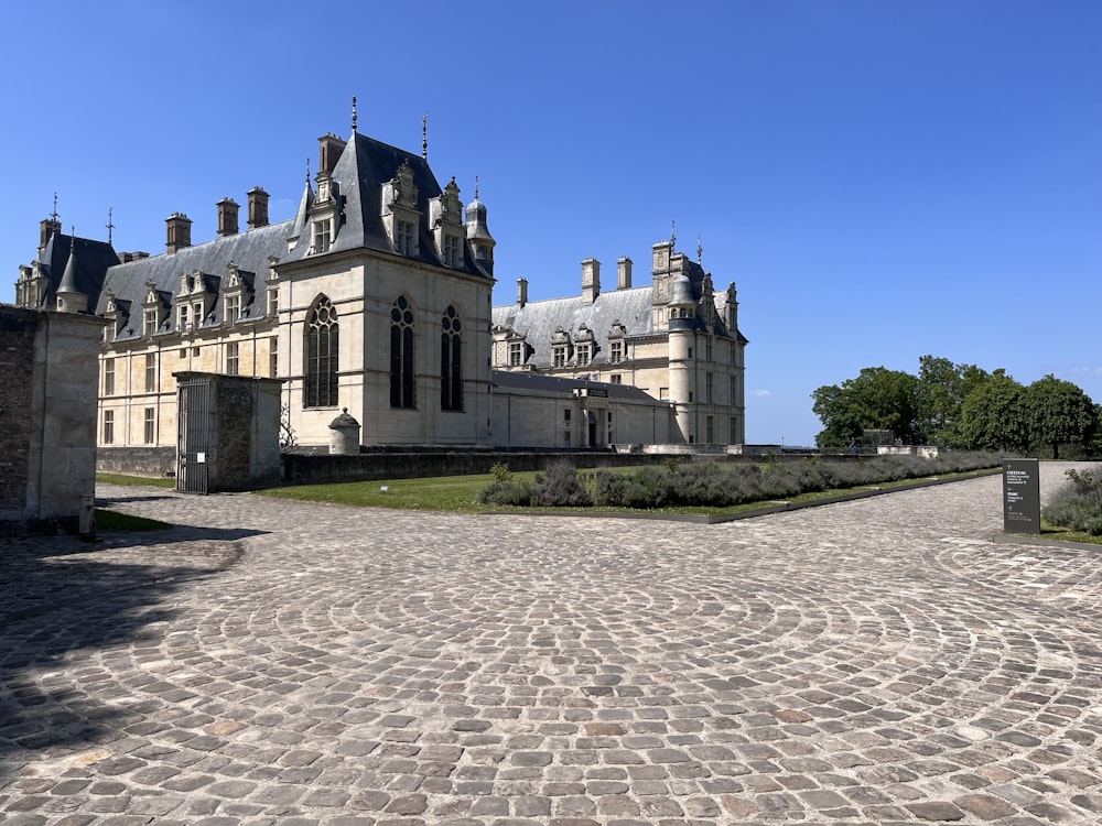 a large stone building with a clock tower on top of it