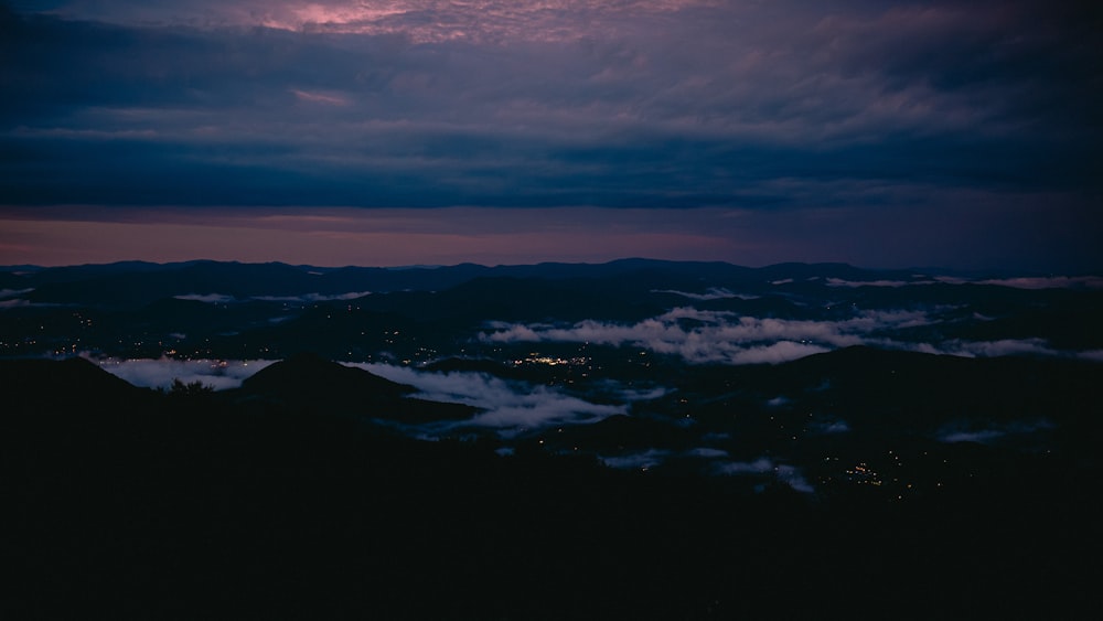 a view of a city from the top of a mountain