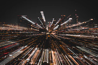 an aerial view of a city at night