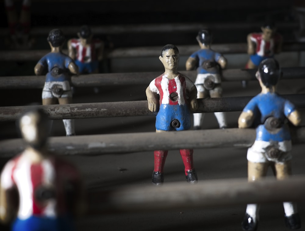 a group of toy figurines of soccer players