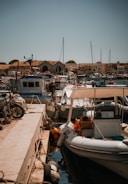 The bustling docks of St. Andrews Marina with boats preparing to set sail.