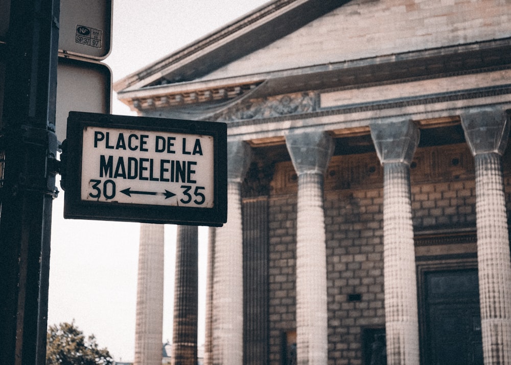 a street sign in front of a building