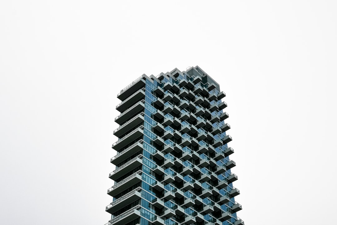 a very tall building with lots of windows a very tall building with lots of windows