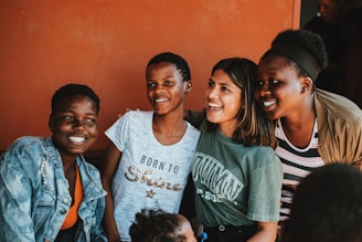a group of people standing next to each other