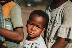a group of people standing next to each other