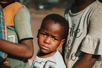 a group of people standing next to each other