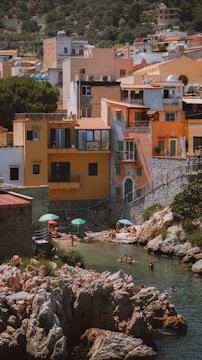 A vibrant coastal village embracing sustainable tourism with eco-friendly accommodations.