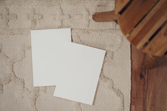 Floor sheets spread out on a clean wooden surface ready for use.