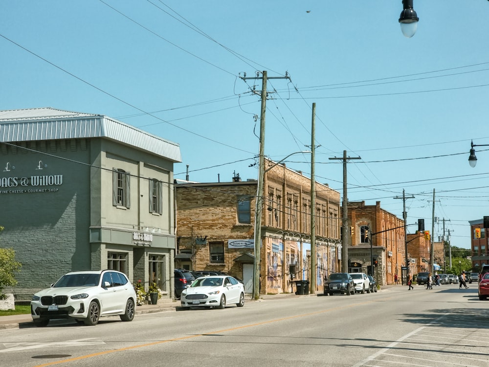 a city street with cars parked on the side of it