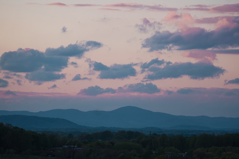 a view of a mountain range at sunset