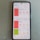 A smartphone displaying the IQAir app with air quality index information. The screen shows data for Kabupaten Bogor, Beijing, and Seoul, with varying air quality levels categorized as 'Unhealthy' for Bogor and Beijing, and 'Good' for Seoul. Weather conditions for the upcoming days are also listed.