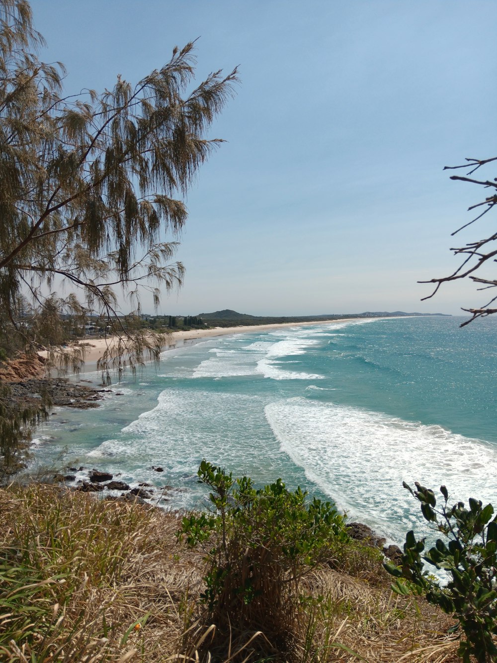 a view of the ocean from a cliff