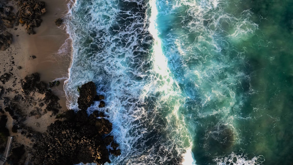 an aerial view of a beach and ocean