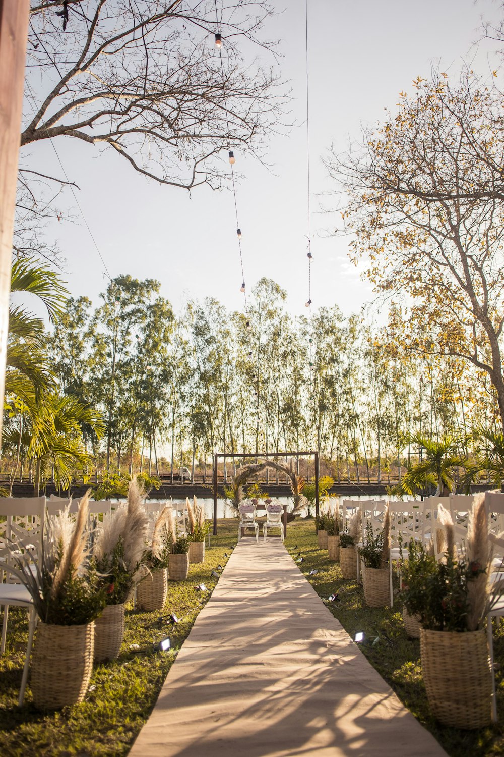 an outdoor wedding venue with a long walkway