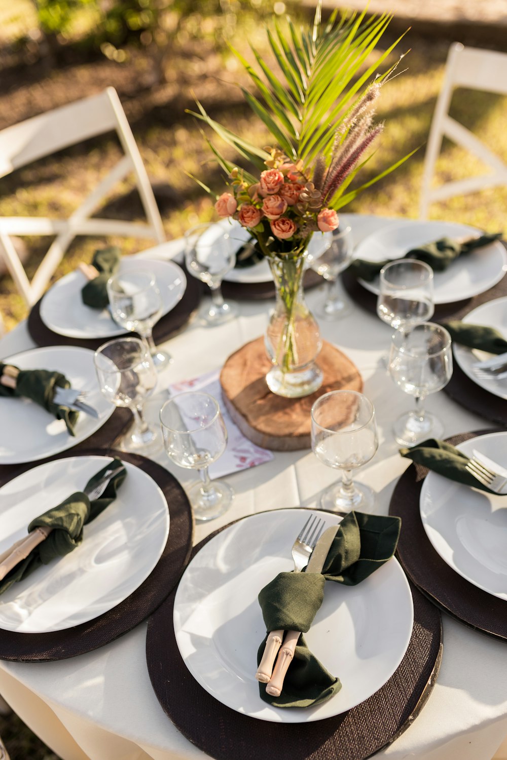 a table set with place settings and place settings