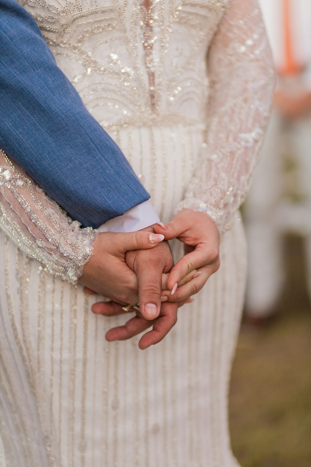 a close up of a person holding a person's hand