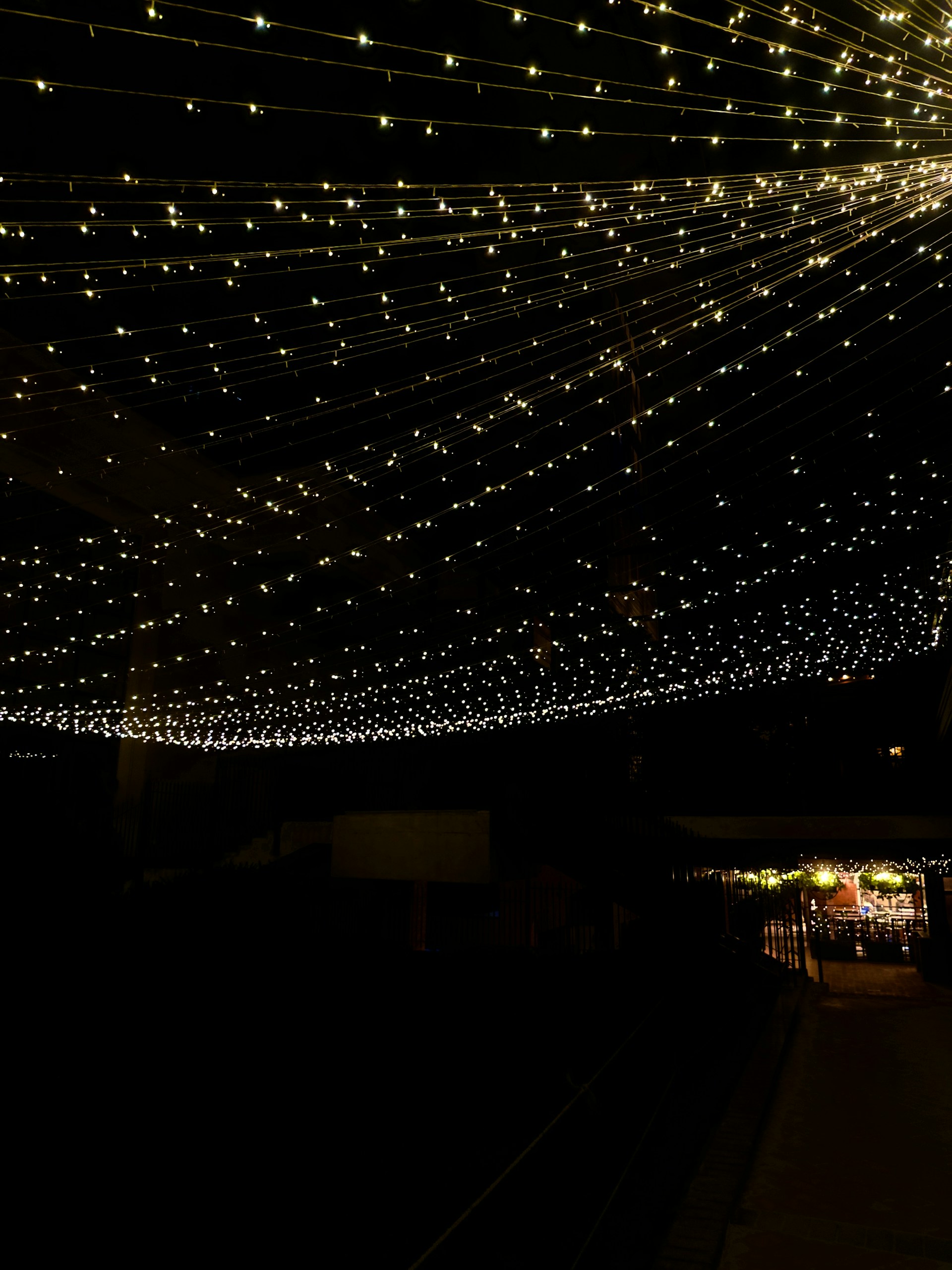woman wearing yellow long-sleeved dress under white clouds and blue sky during daytime