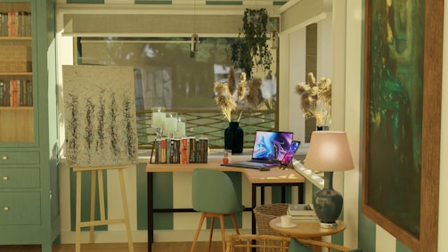 a room with a desk, chair, bookshelf and a laptop