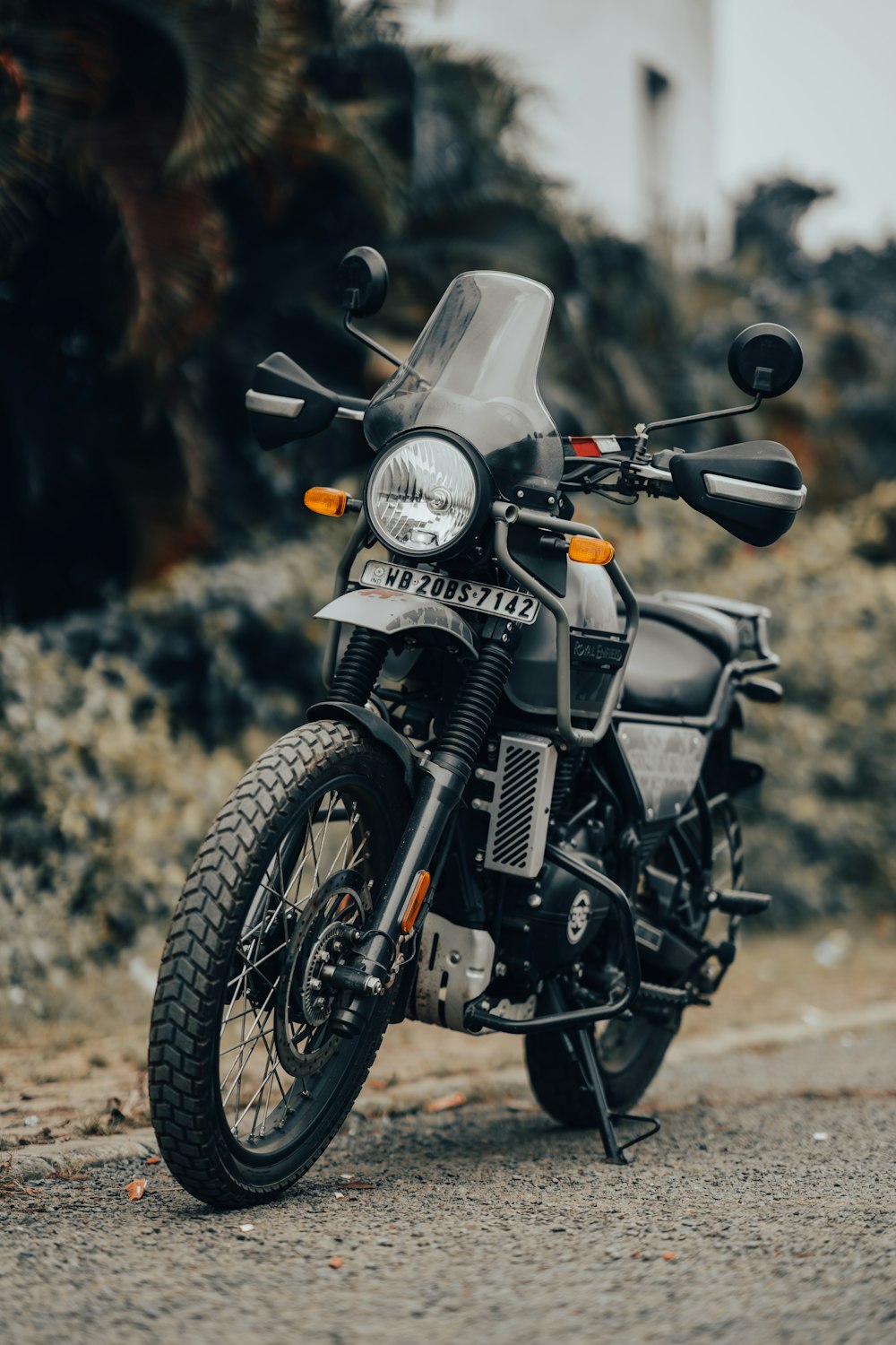 a motorcycle parked on the side of the road