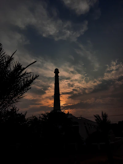 a tall tower with a clock on top of it