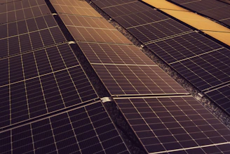 several rows of solar panels on a roof