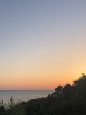 A serene sunset view over the ocean horizon.