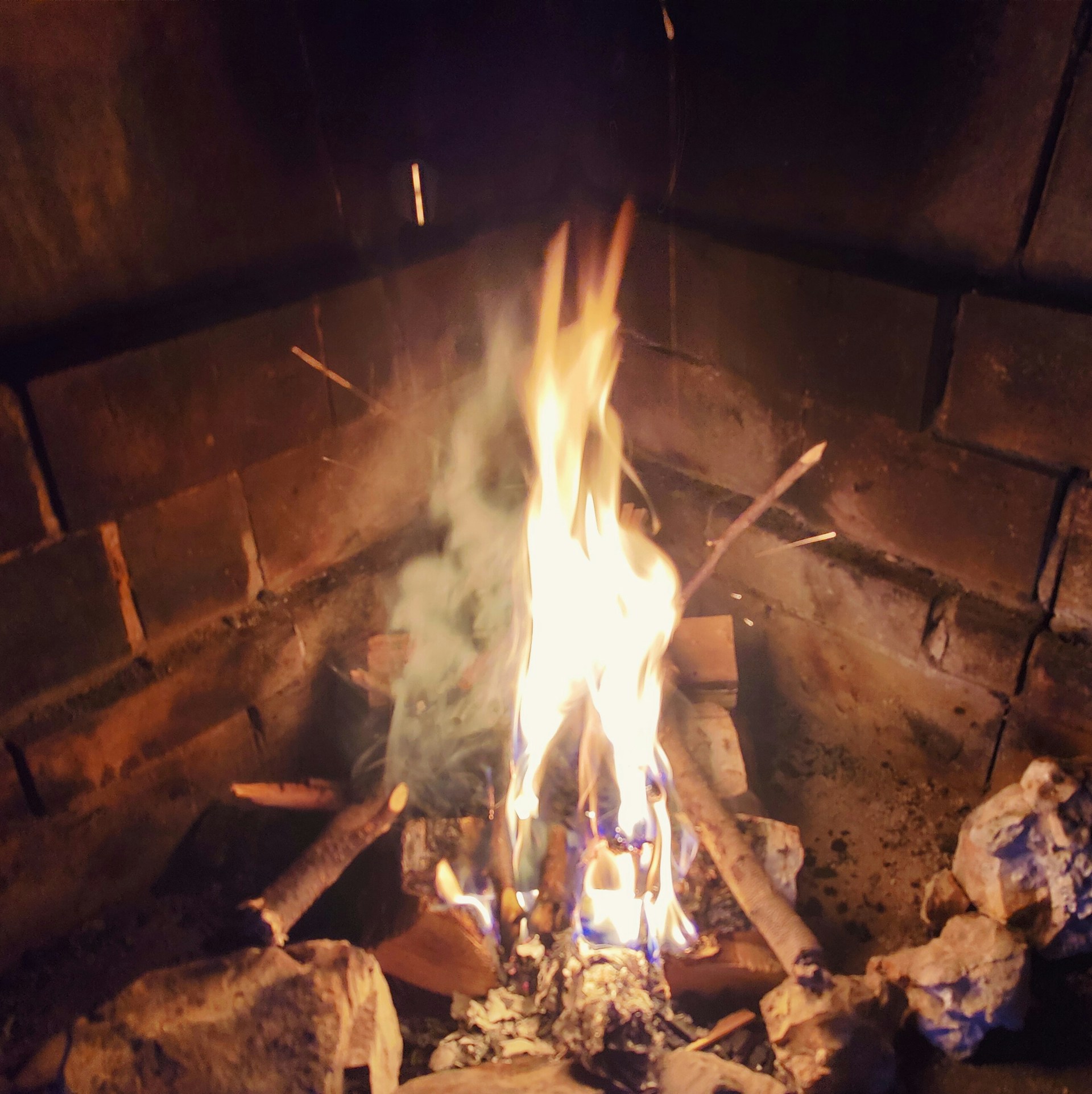 woman wearing yellow long-sleeved dress under white clouds and blue sky during daytime