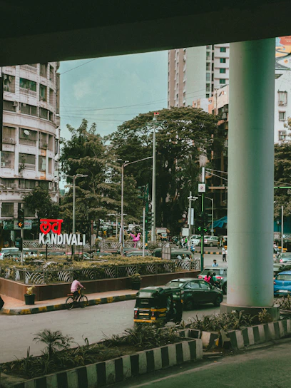 A busy Mumbai street featuring Surakshavistaar's bright traffic cones and speed breakers in action.