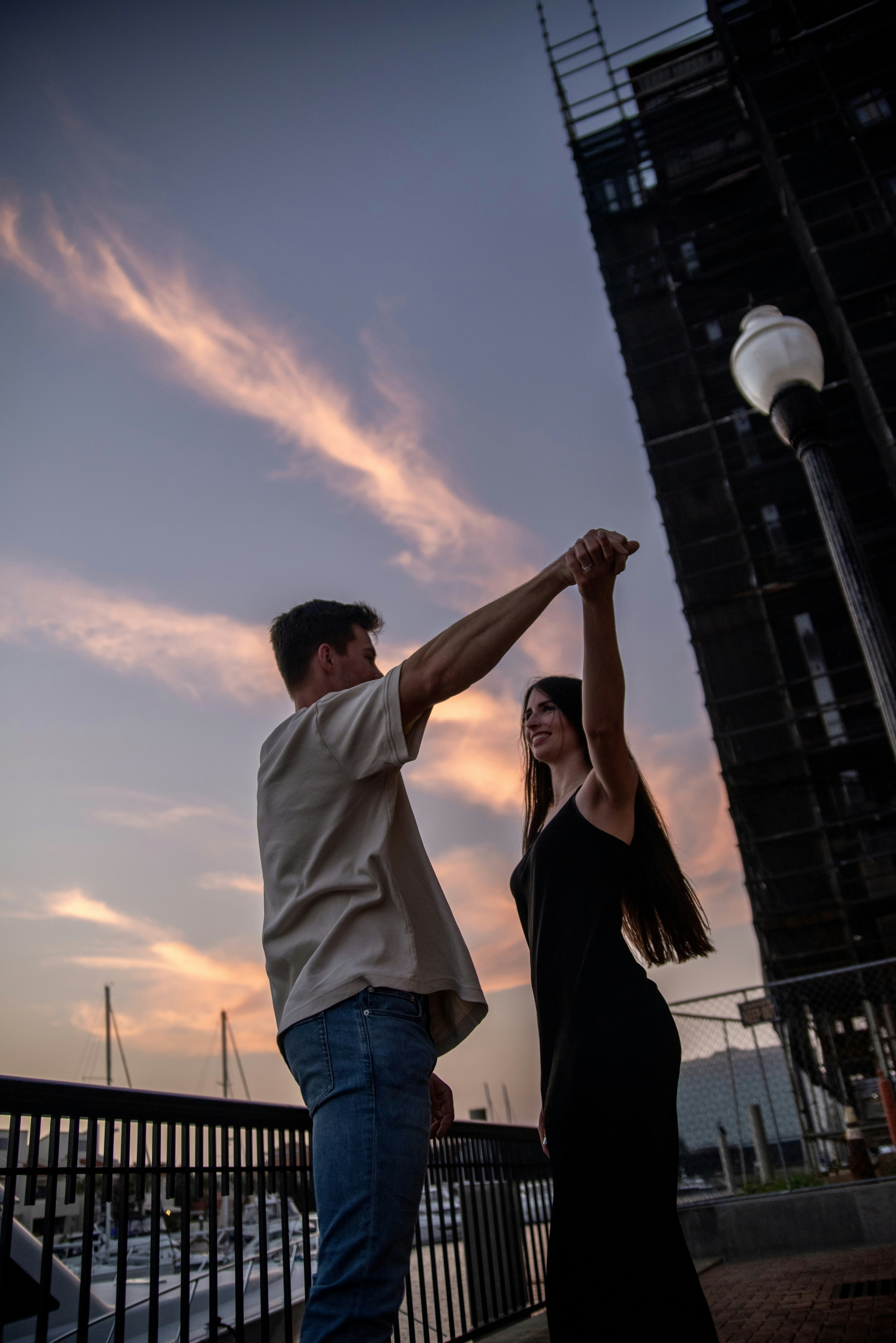 a man and a woman are holding hands