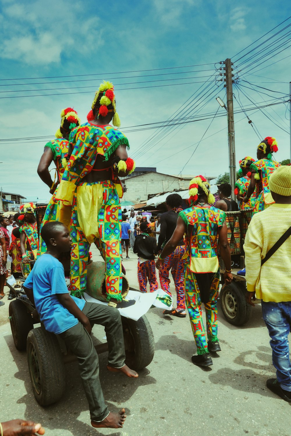 a group of people dressed in brightly colored clothing