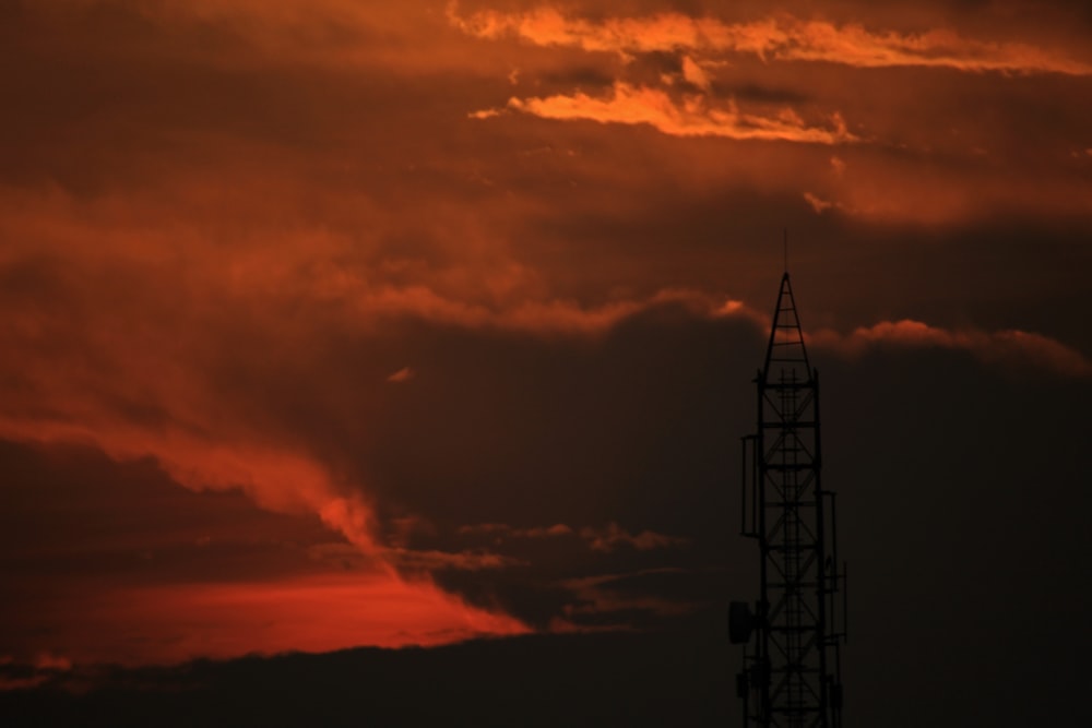 a tall tower with a sky in the background