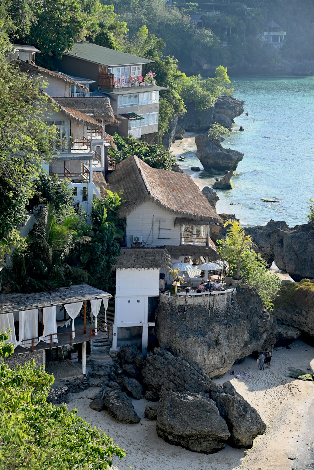 a house on a cliff overlooking the ocean