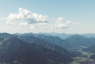 A panoramic view of the Pyrenees mountains with lush green valleys in Navarra.