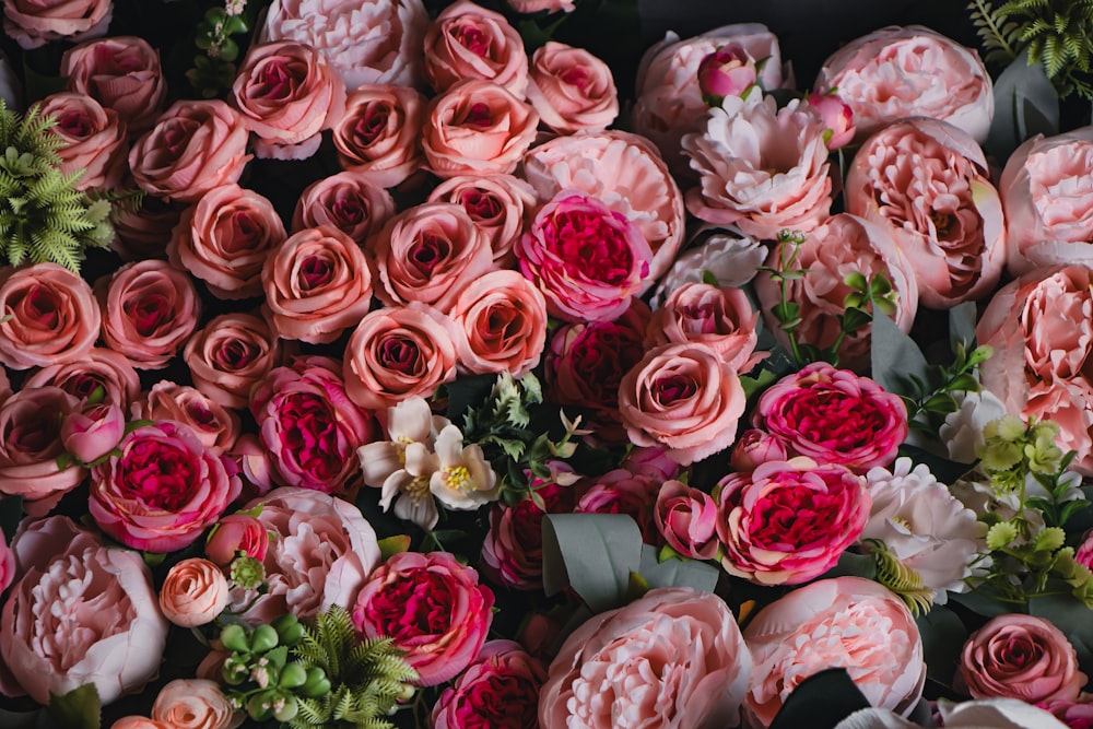 a bunch of flowers that are sitting on a table