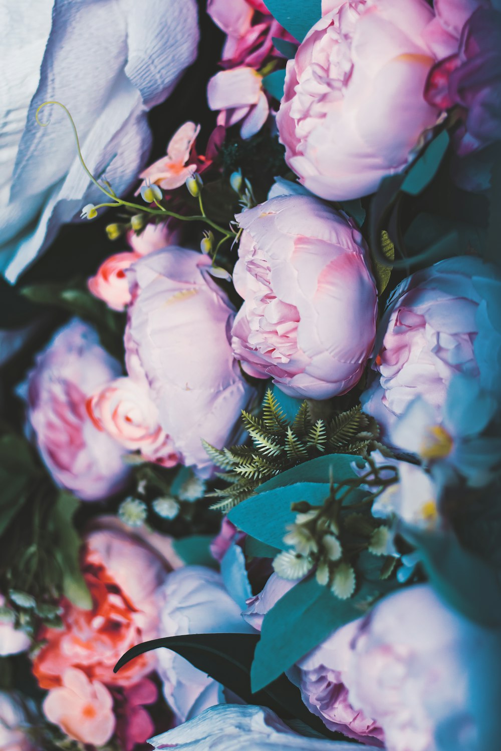 a bunch of flowers that are on a table