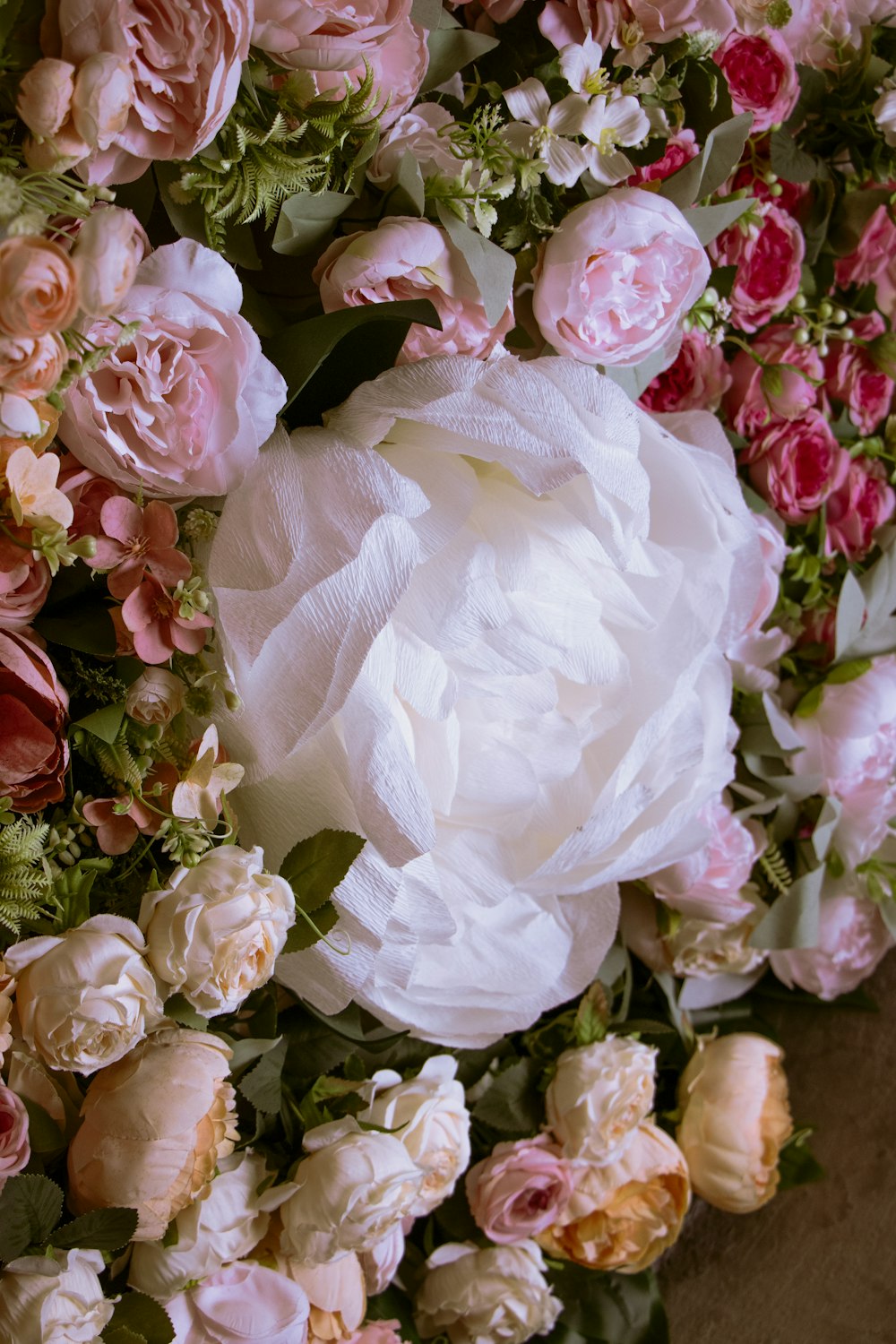 a bunch of flowers that are on a table