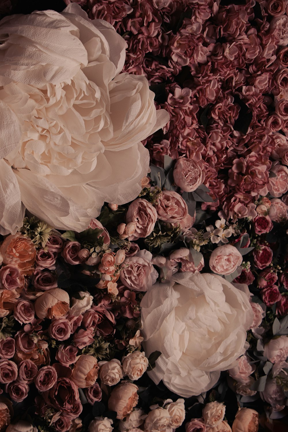 a bunch of flowers that are on a table