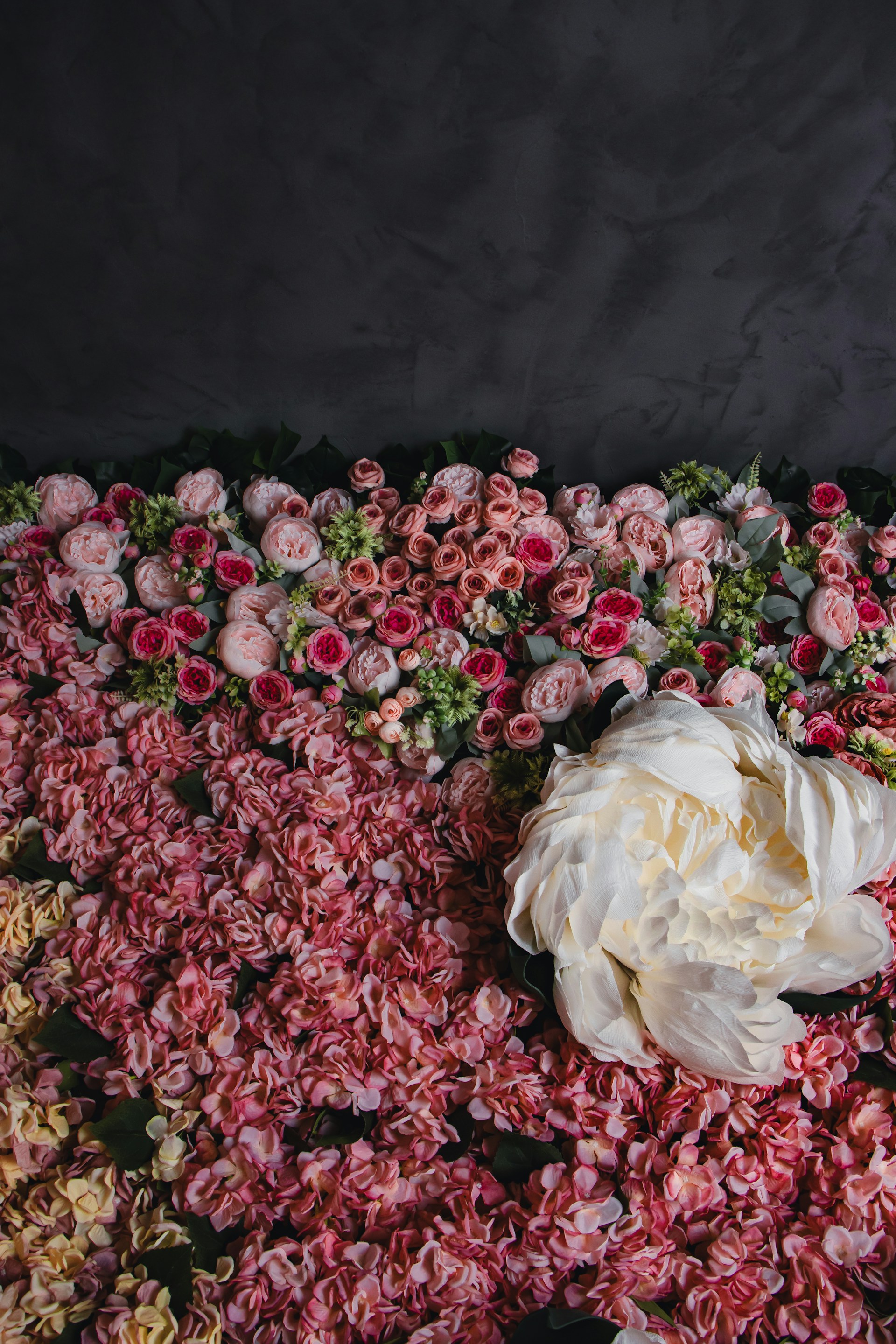 woman wearing yellow long-sleeved dress under white clouds and blue sky during daytime