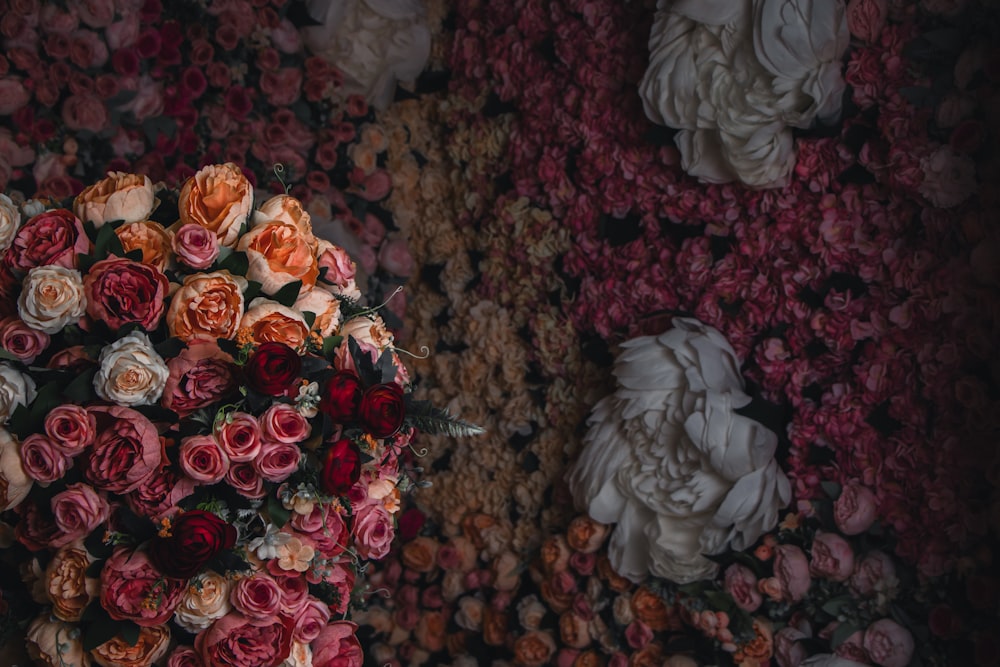 a bunch of flowers that are sitting on a table