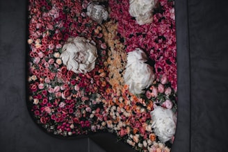 An assortment of seasonal flowers arranged artistically.