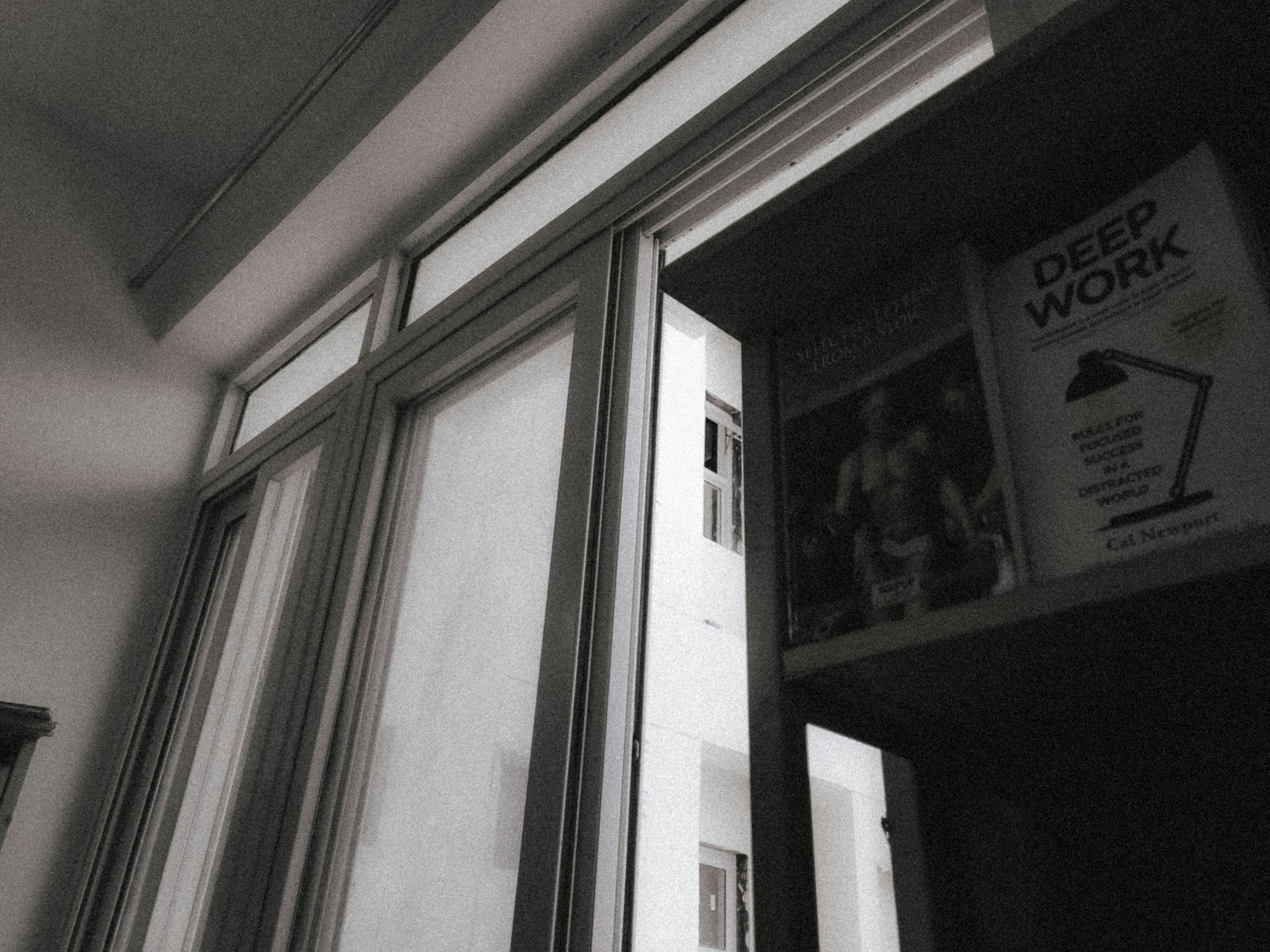 a black and white photo of a window