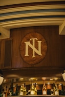 Laser-engraved wooden plaque with a personalized message in warm lighting.