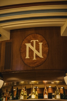 Close-up of a beautifully laser-engraved wooden plaque with elegant lettering.